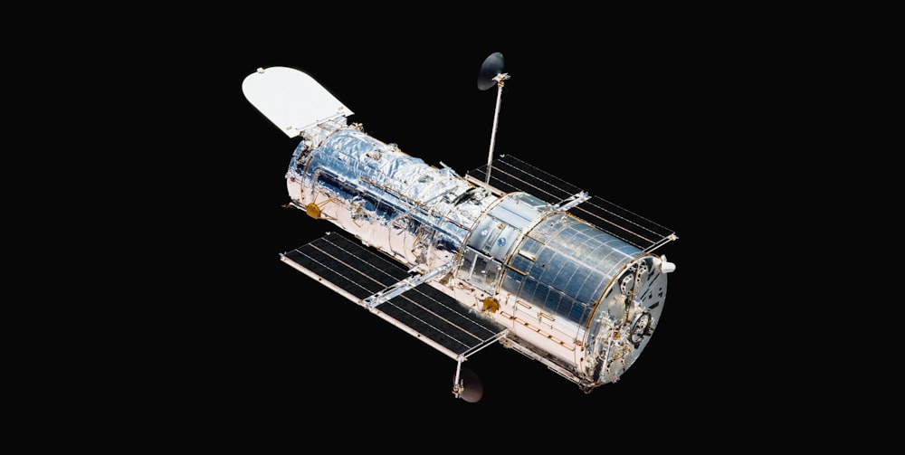 a satellite with a satellite antenna attached to it