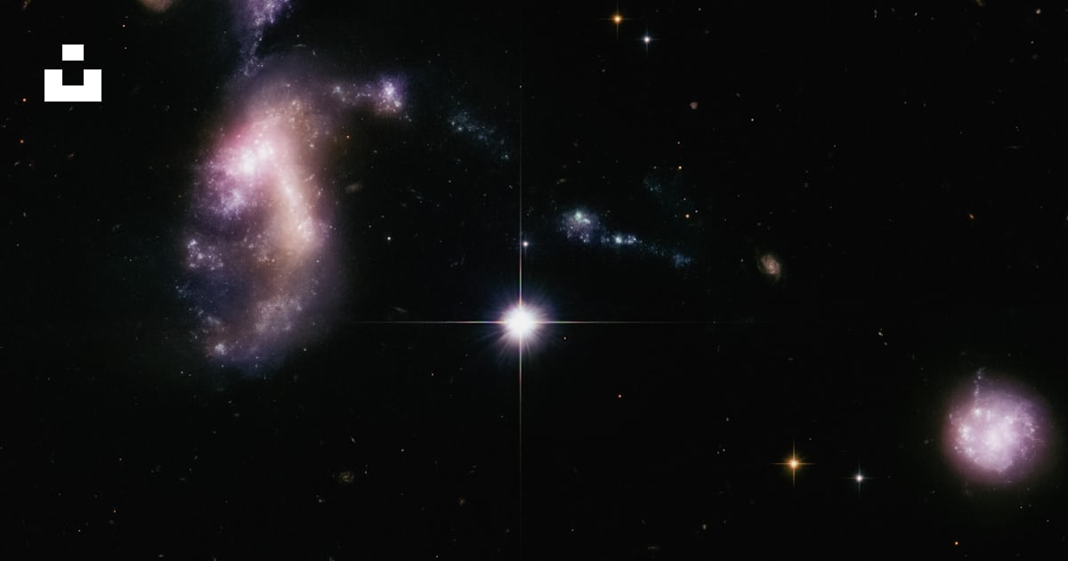 A Group Of Galaxy Like Objects In The Sky Photo Free Outer Space a-group-of-galaxy-like-objects-in-the-sky-photo-free-outer-space