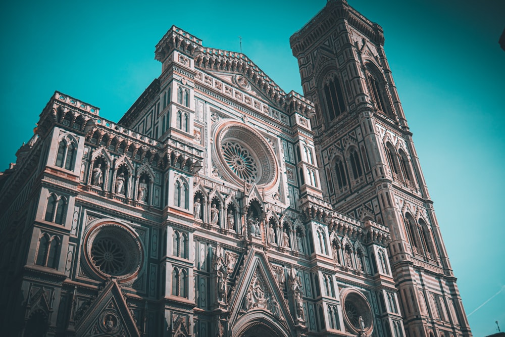 a large cathedral with a clock on the front of it