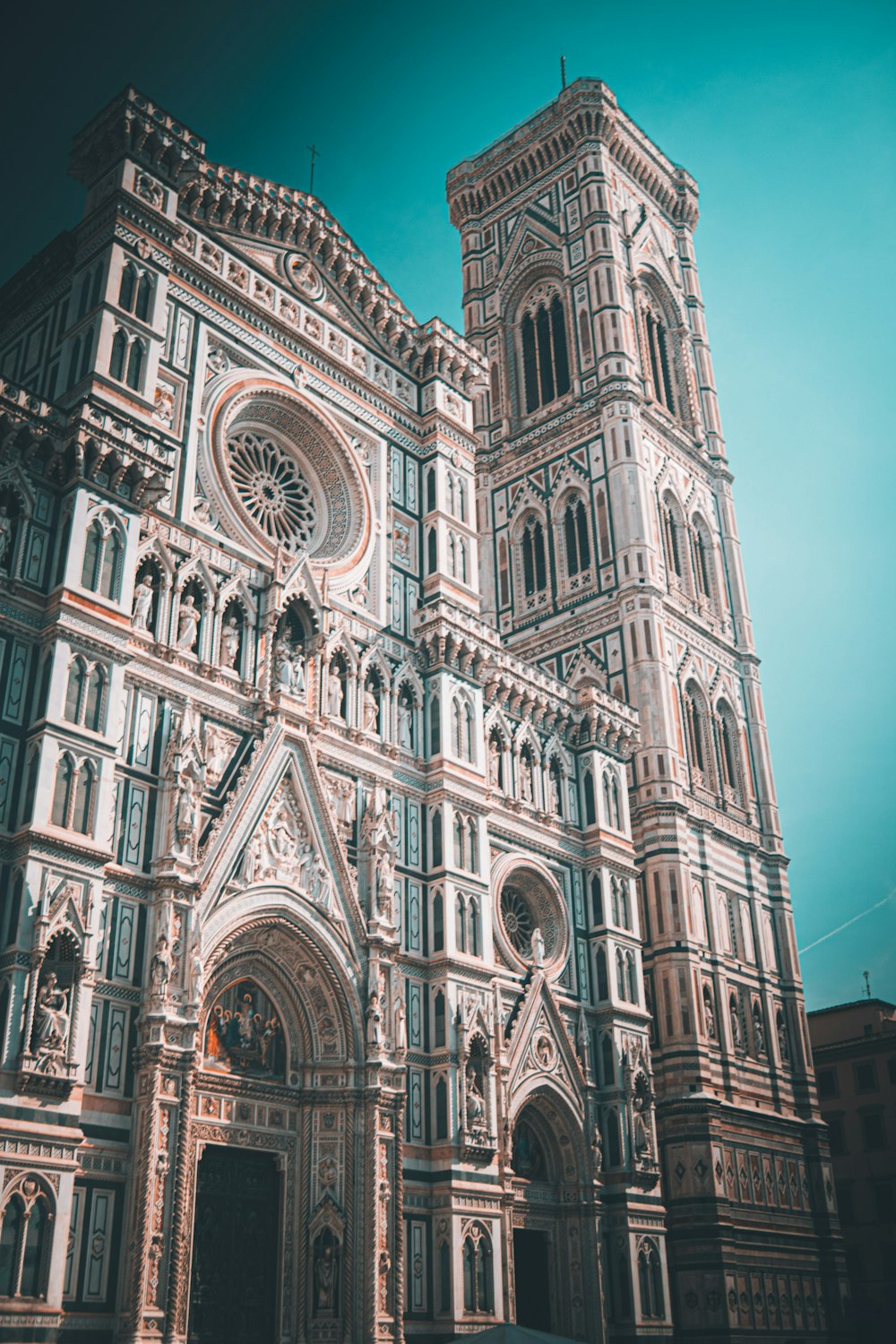 a large cathedral with a clock on the front of it