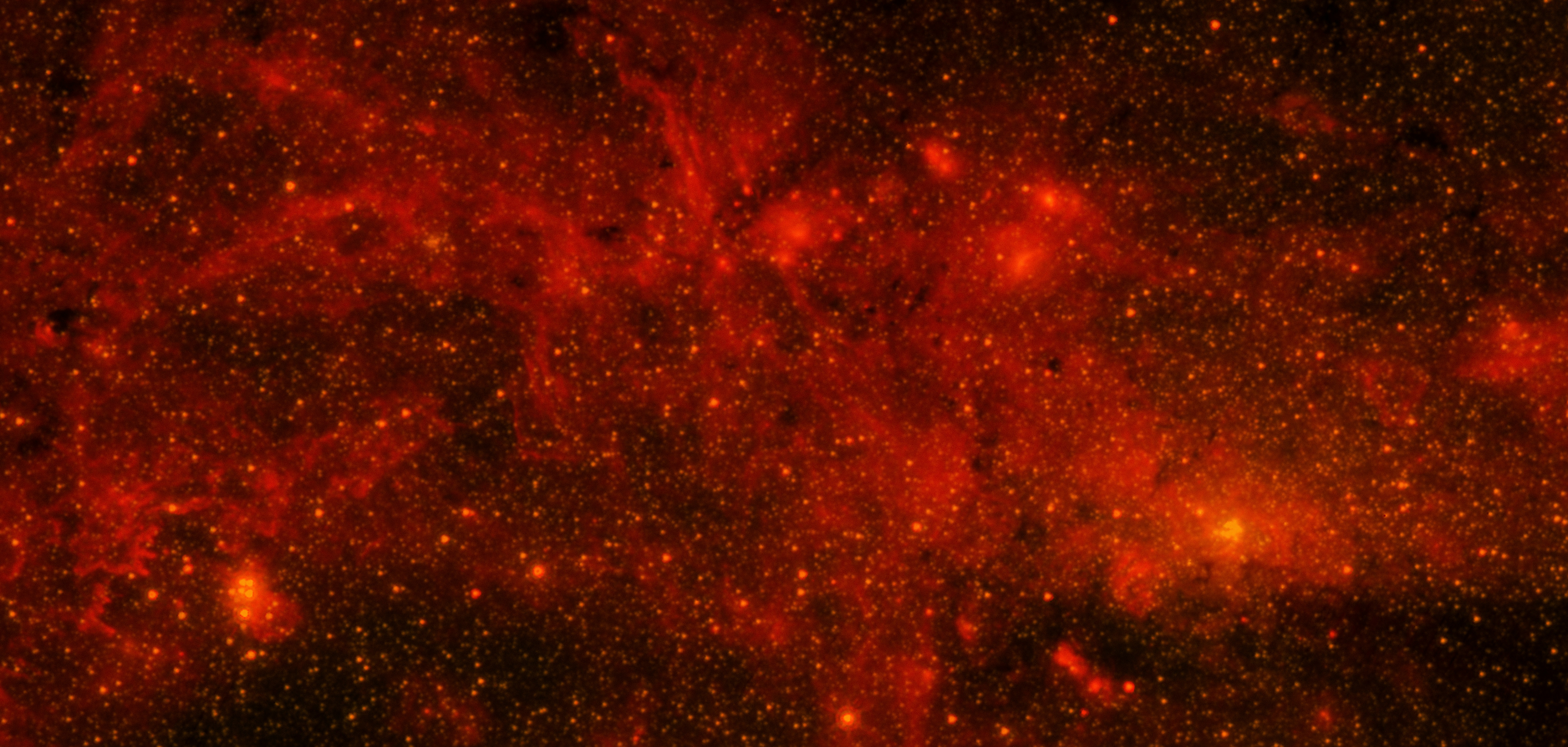 a red and black space filled with stars, Galactic Center Region in Infrared from Spitzer Caption The Spitzer Space Telescope