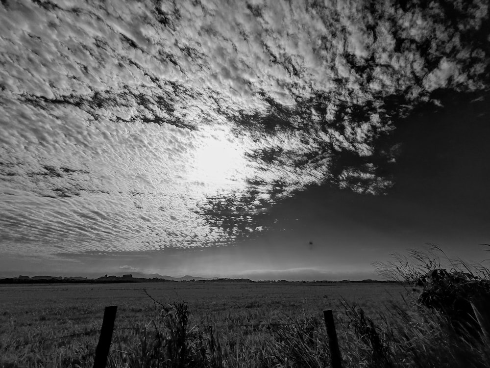 a black and white photo of a cloudy sky