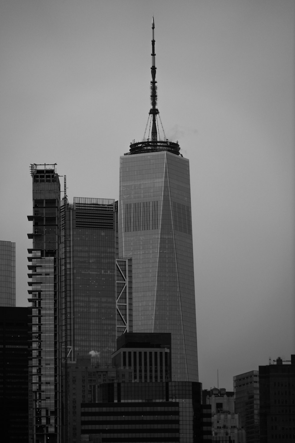 a black and white photo of a very tall building