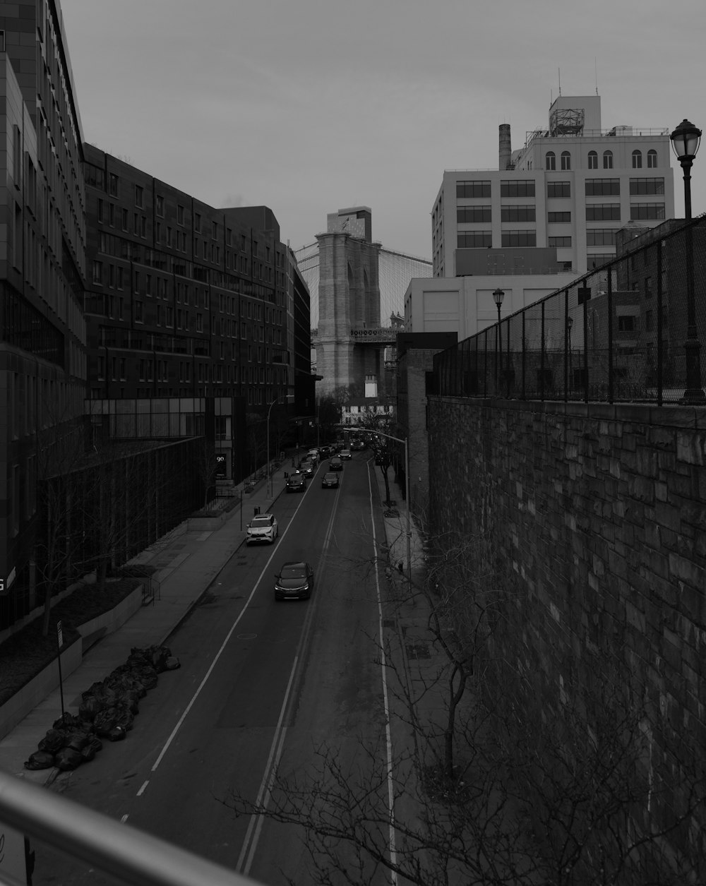 a black and white photo of a city street