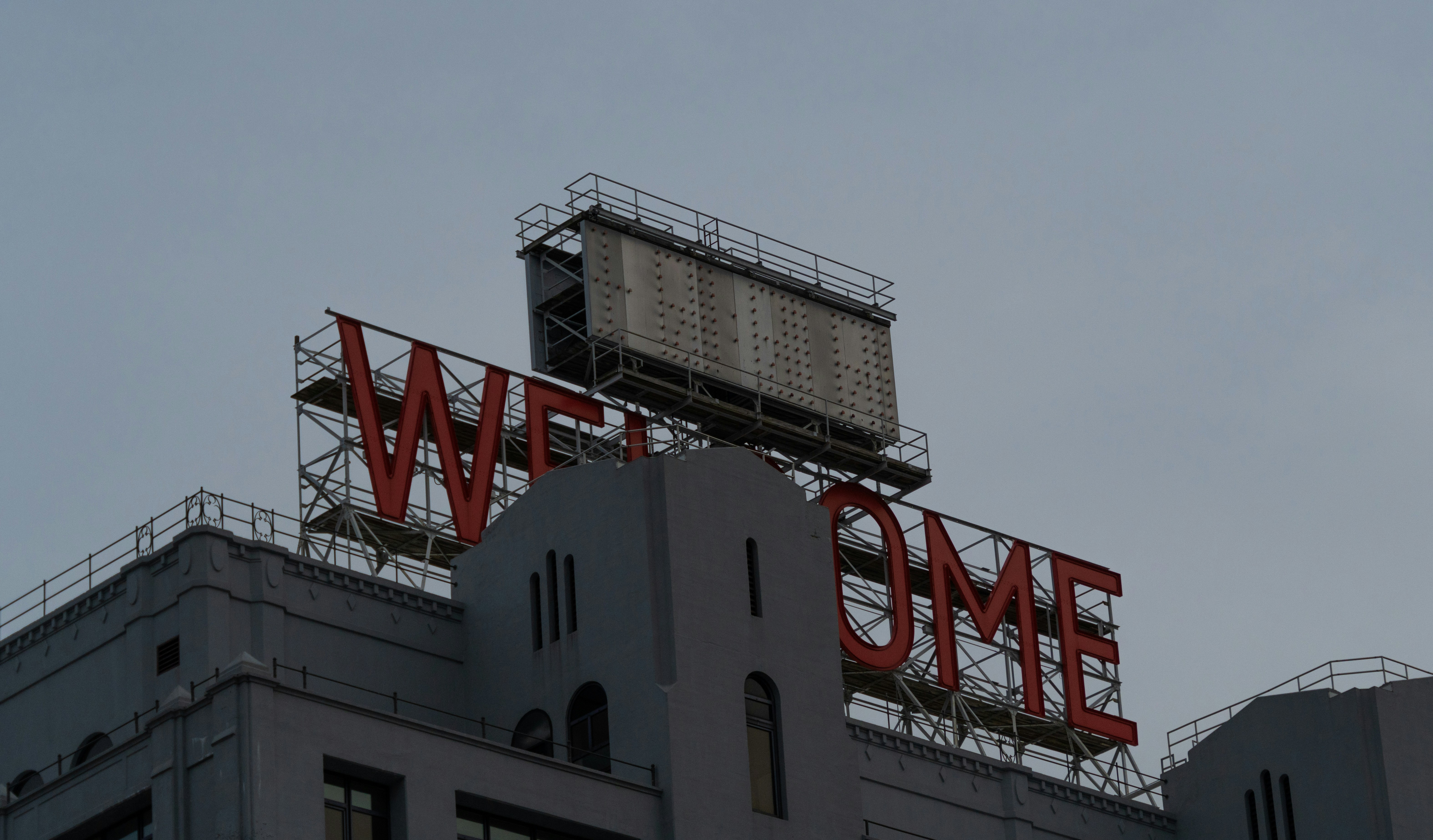 a building with a large sign on top of it