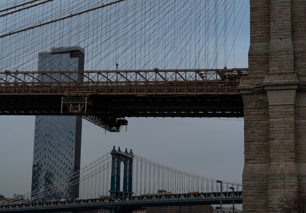 a view of the brooklyn bridge from across the river