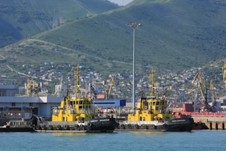 a couple of boats that are sitting in the water