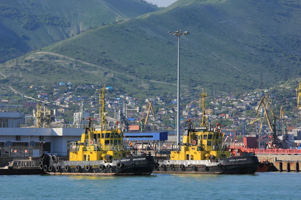 a couple of boats that are sitting in the water