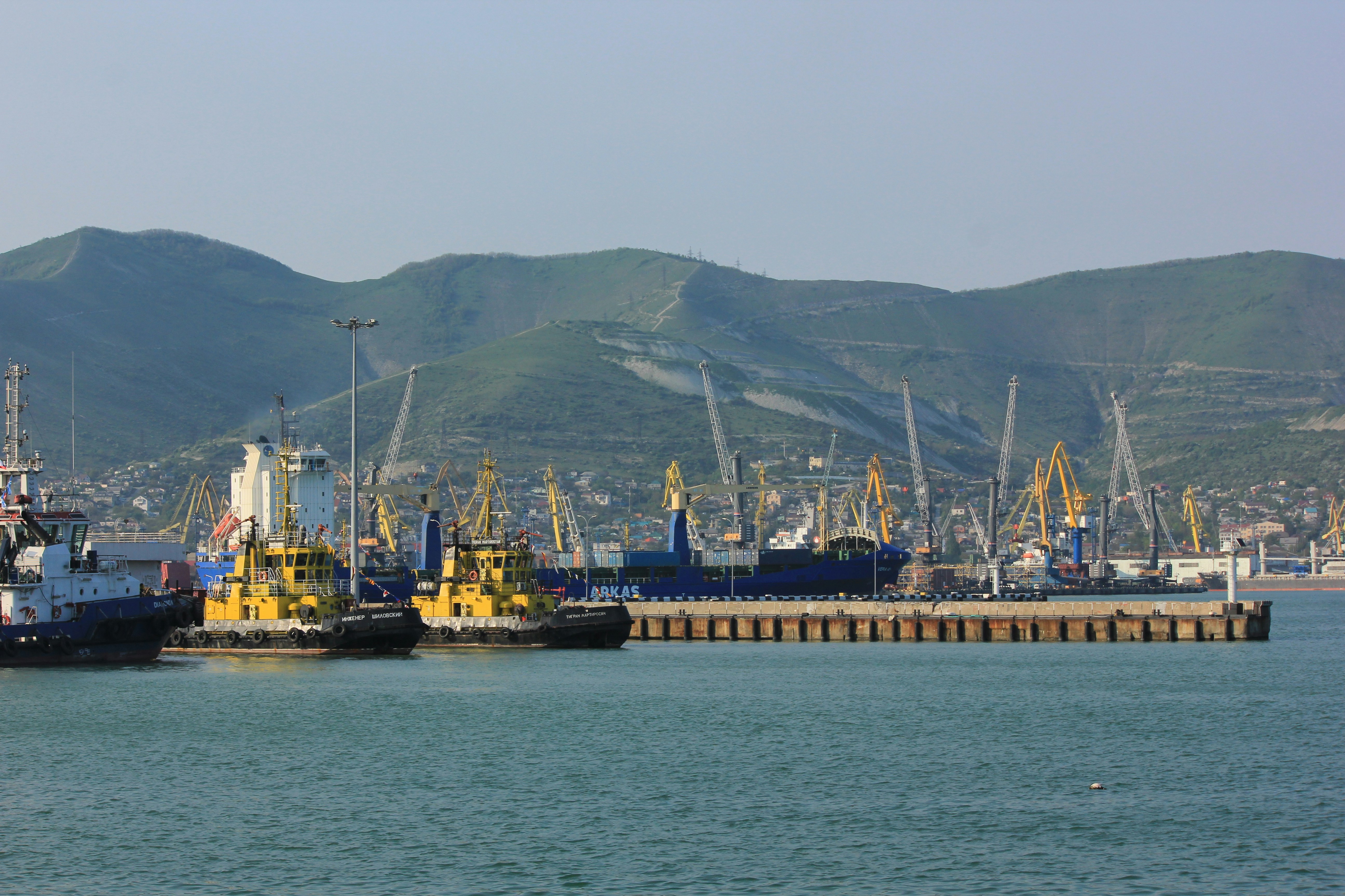 a group of boats that are sitting in the water