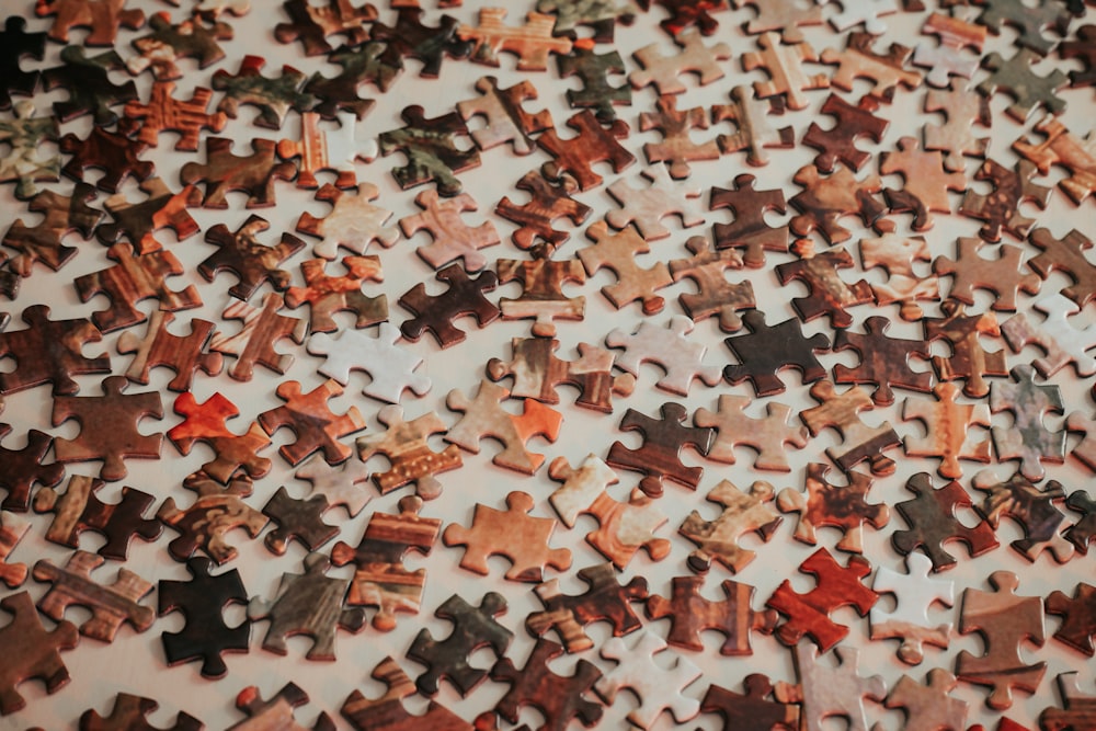 a close up of a puzzle on a table