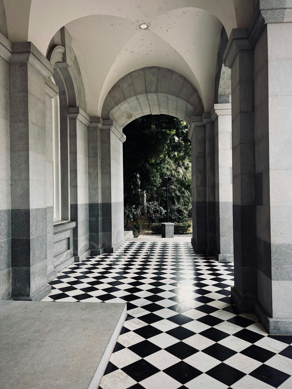 a black and white checkered floor in a building