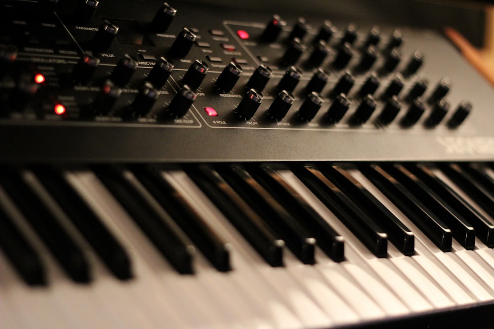 a close up of a keyboard with many keys