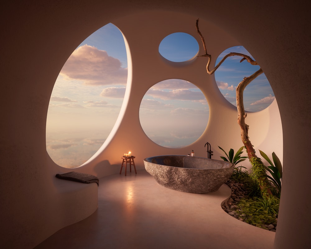 a bathroom with a round window and a bathtub