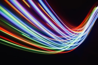 a blurry photo of colorful lights in the dark