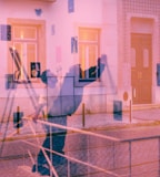 a blurry image of a person standing in front of a building