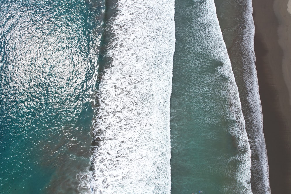 an aerial view of a beach and ocean