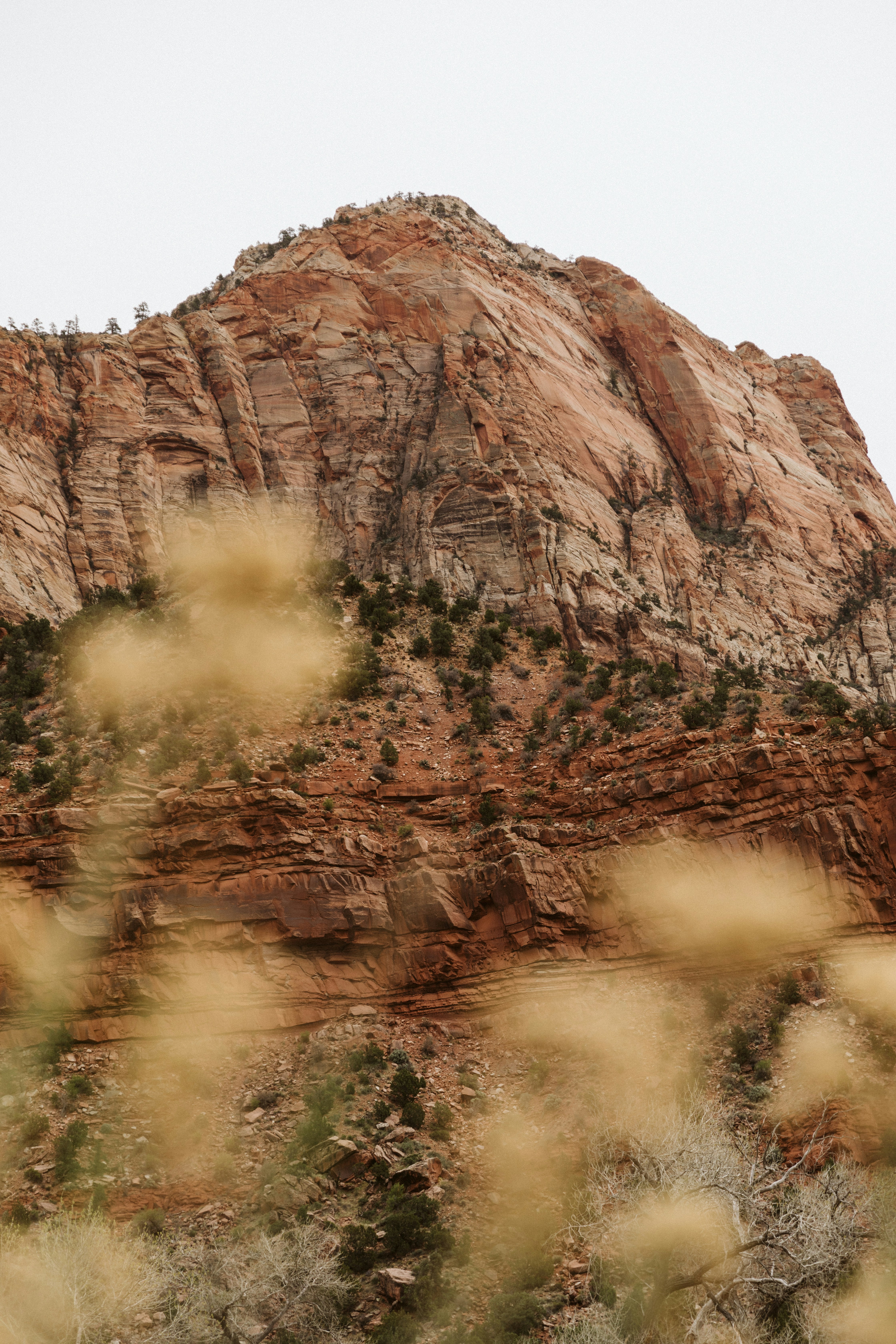 a mountain with a very tall rock in the background