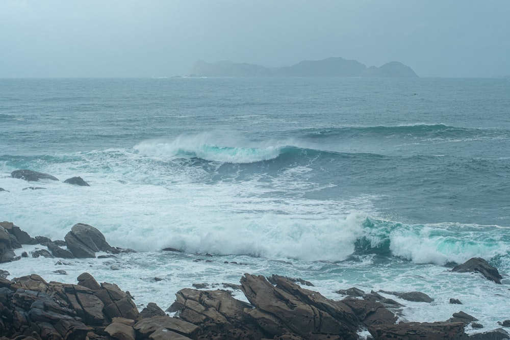 a large body of water surrounded by rocks