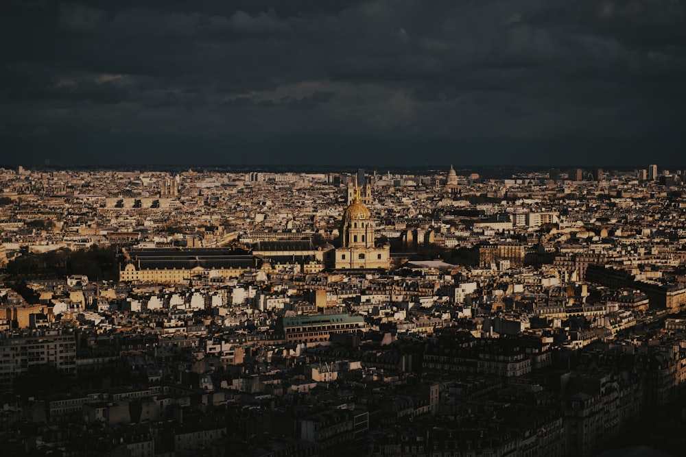 an aerial view of a city with tall buildings