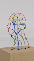 a sculpture of a man's head made of colored wires