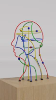 a sculpture of a man's head made of colored wires