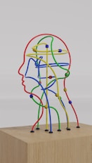 a sculpture of a man's head made of colored wires