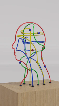 a sculpture of a man's head made of colored wires
