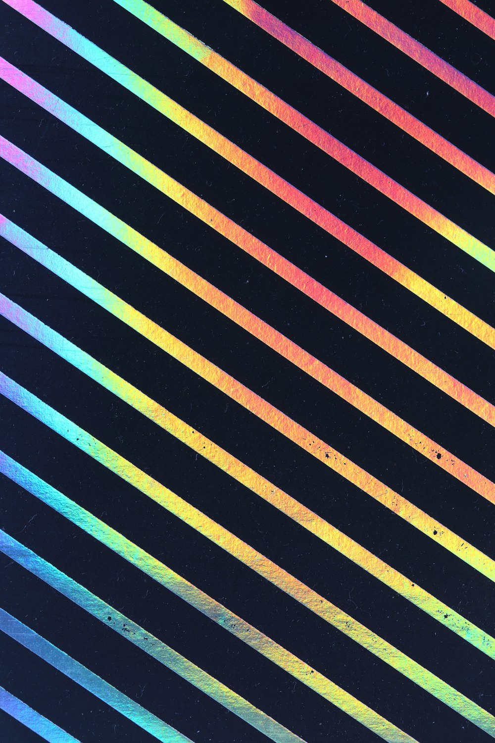 a black background with multicolored lines on it
