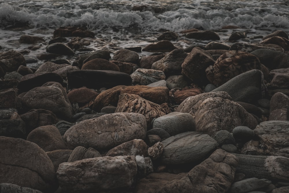 a rocky beach covered in lots of rocks