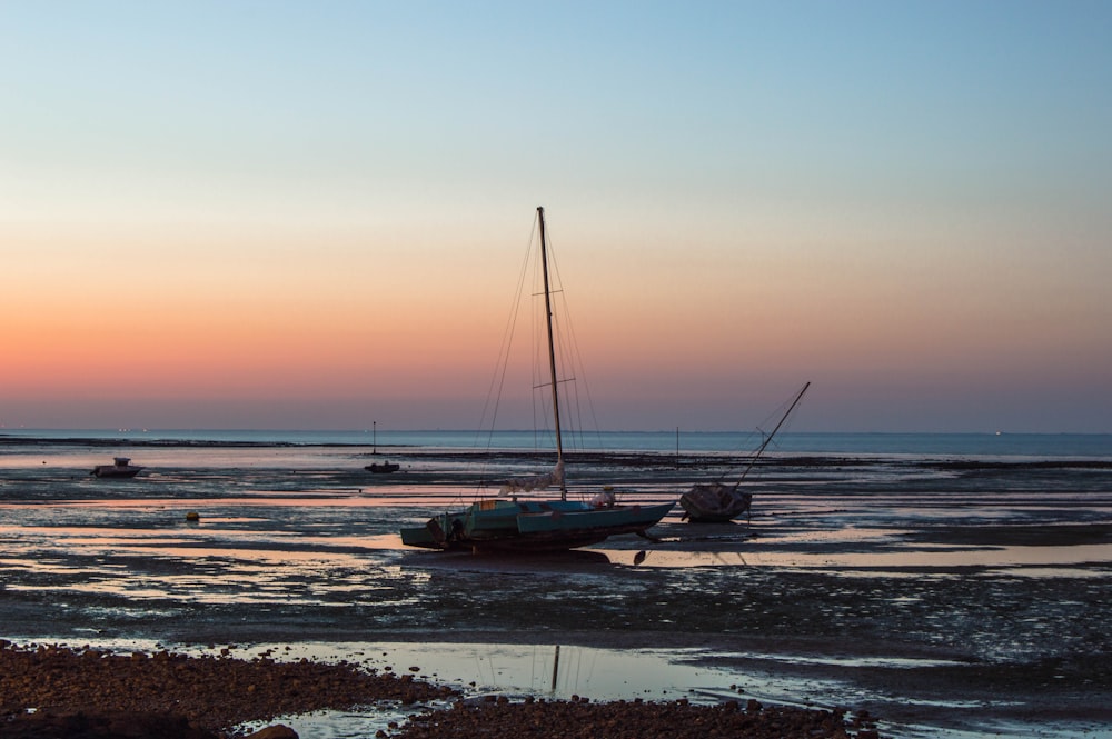 a couple of boats that are sitting in the water