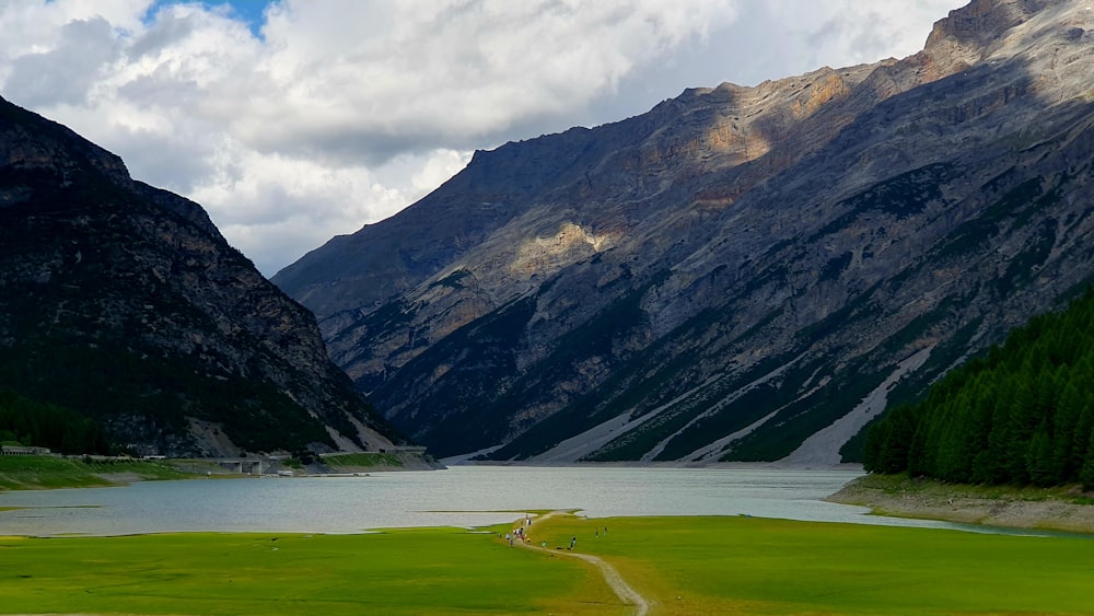 a scenic view of a lake and mountains