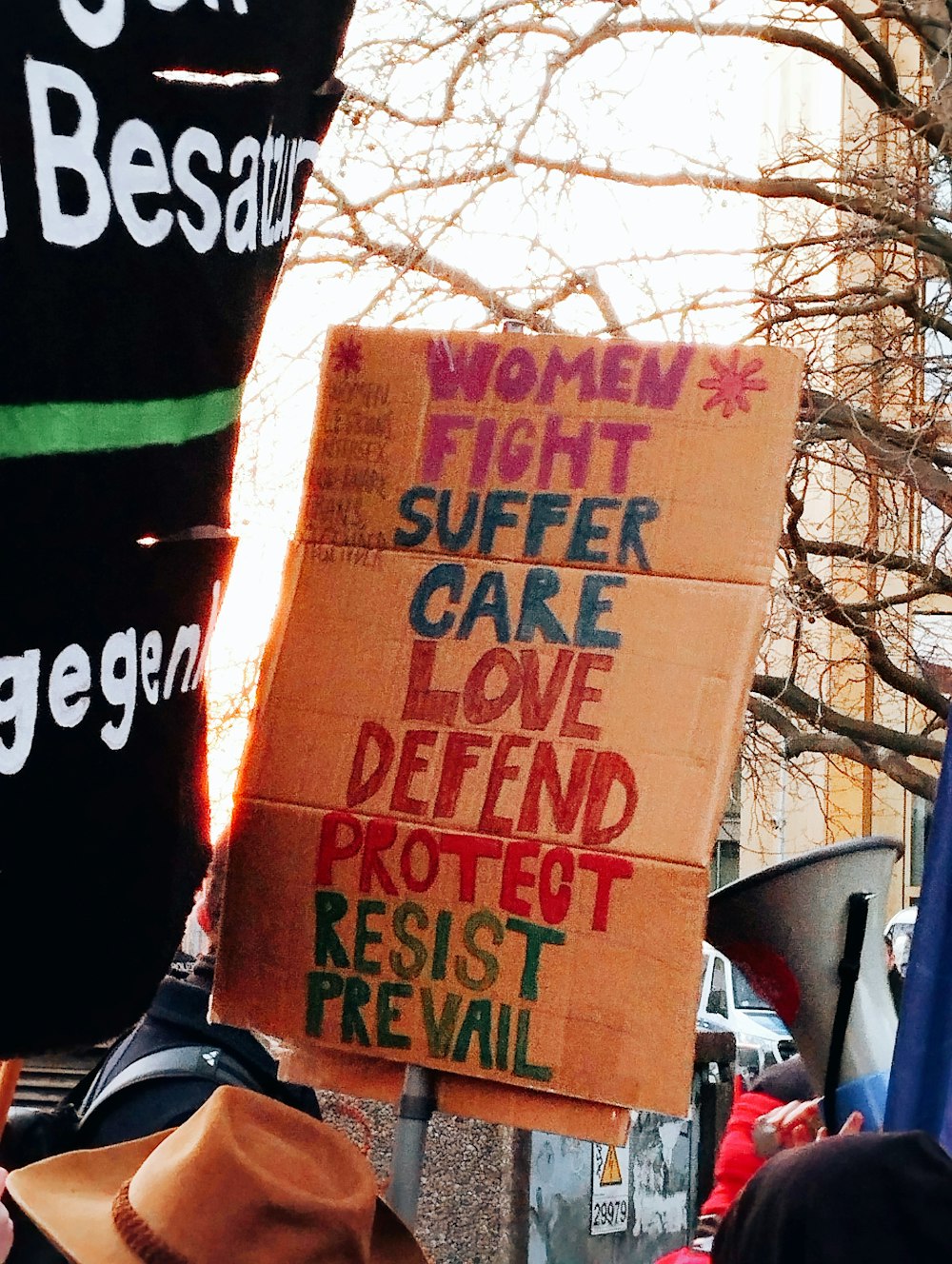 a protest sign with women's rights written on it