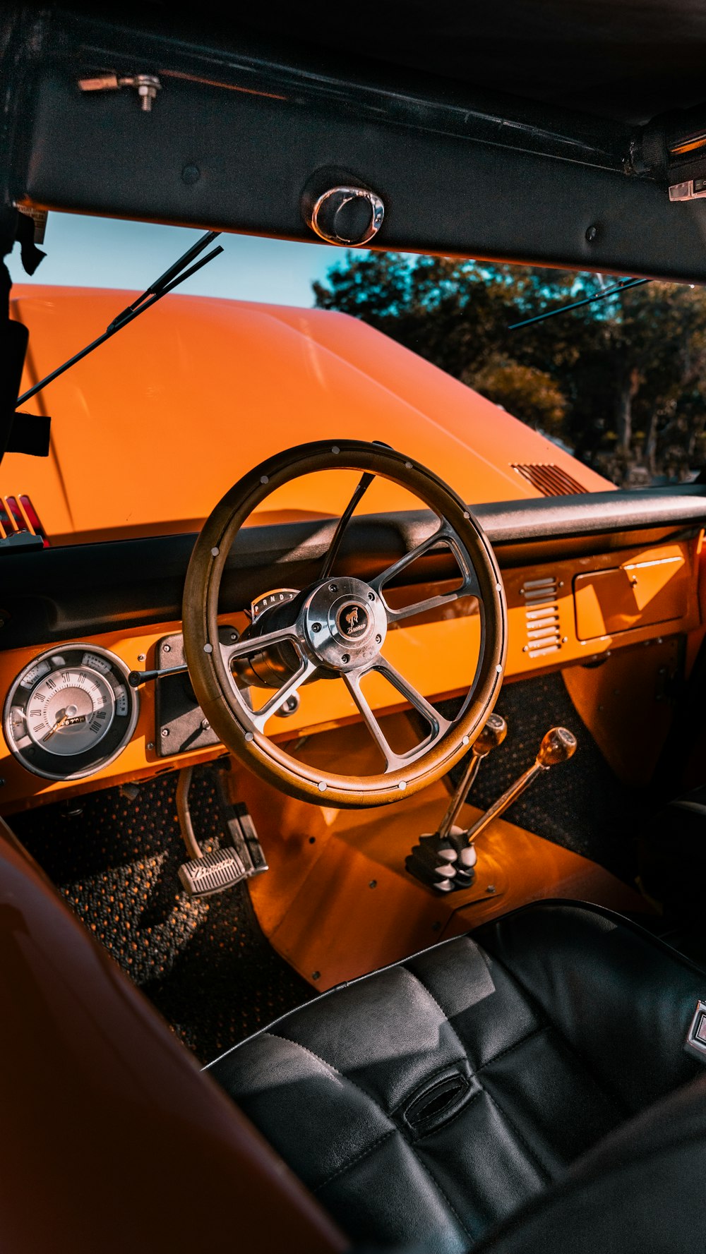 the interior of a car with a steering wheel