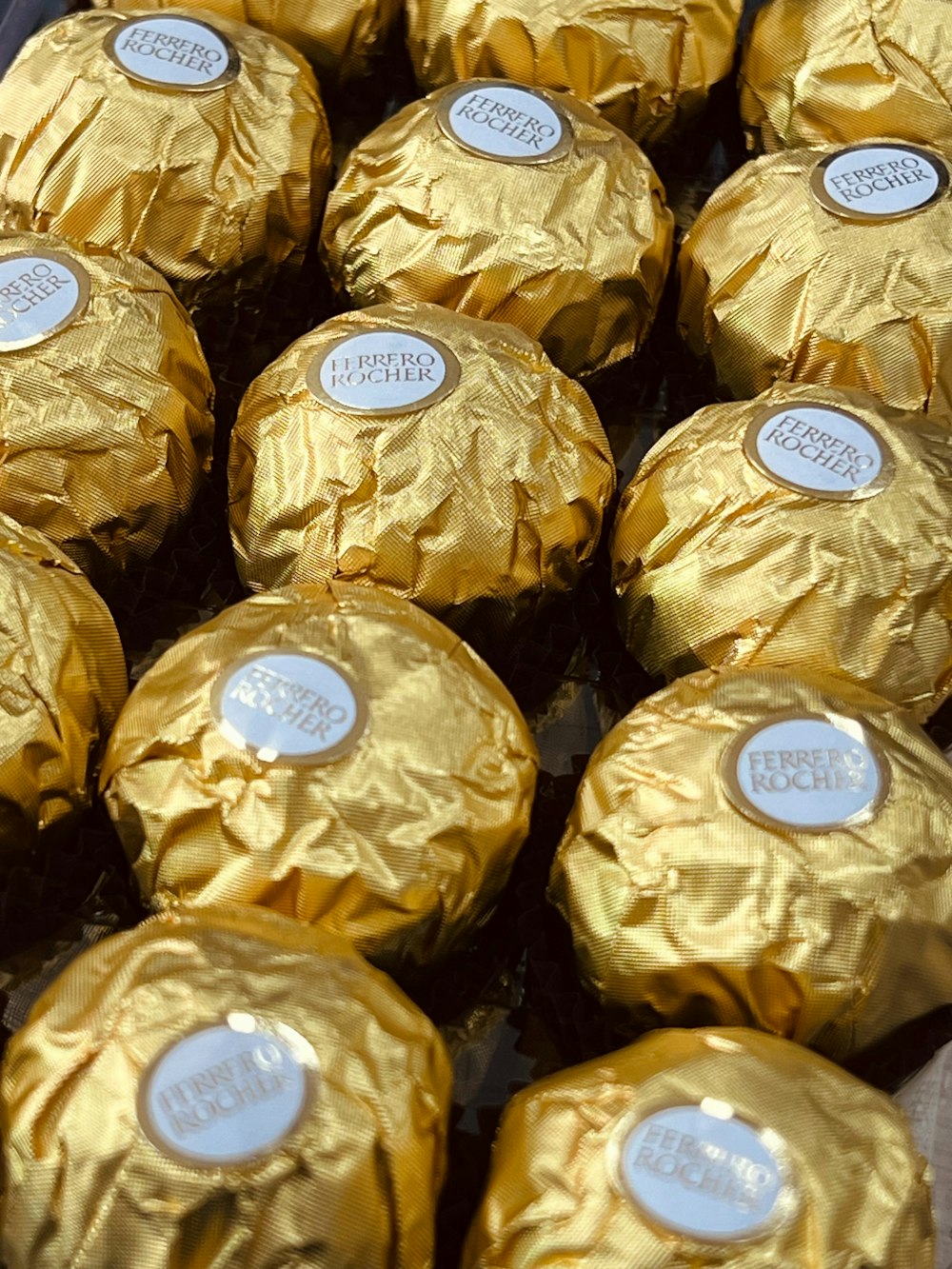 a close up of a bunch of chocolate candies