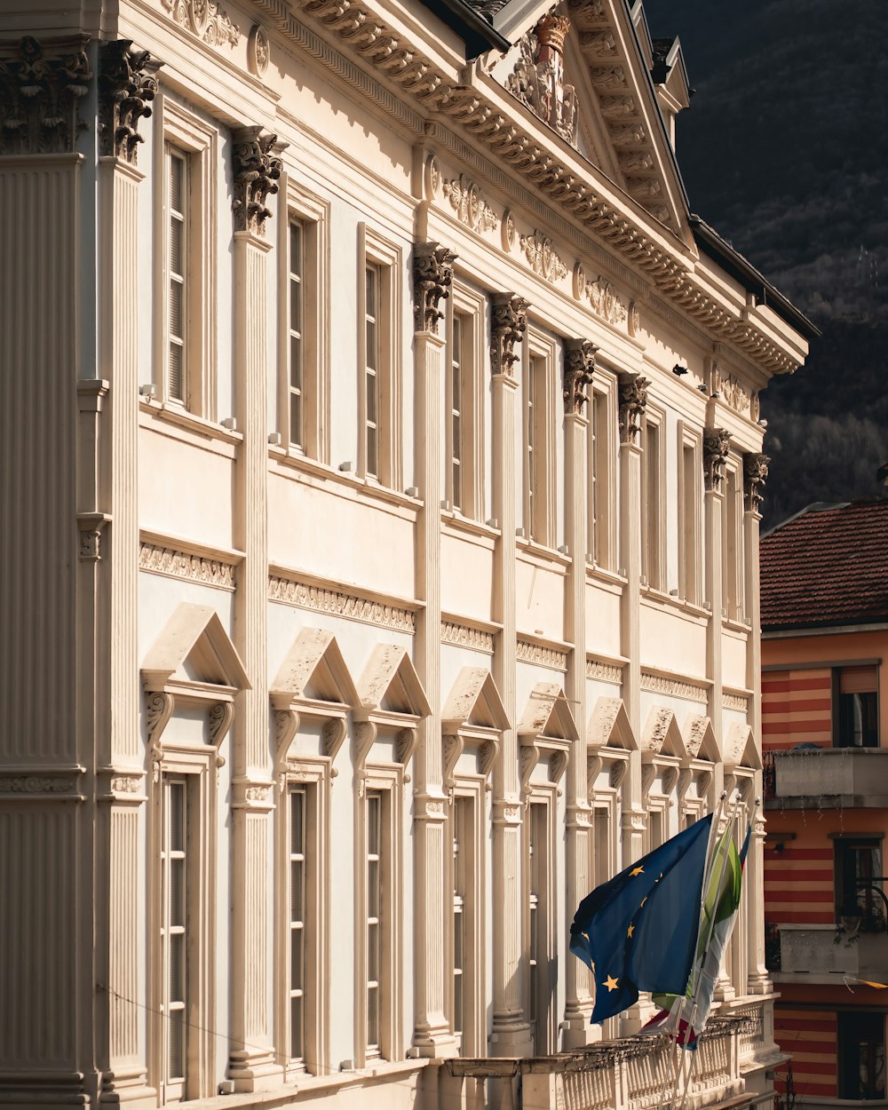 a building with a flag flying in front of it