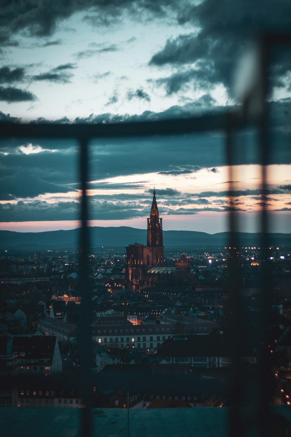 a view of a city at night from a window