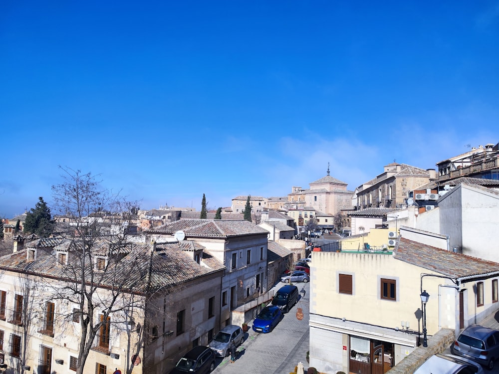 a view of a city from the top of a hill