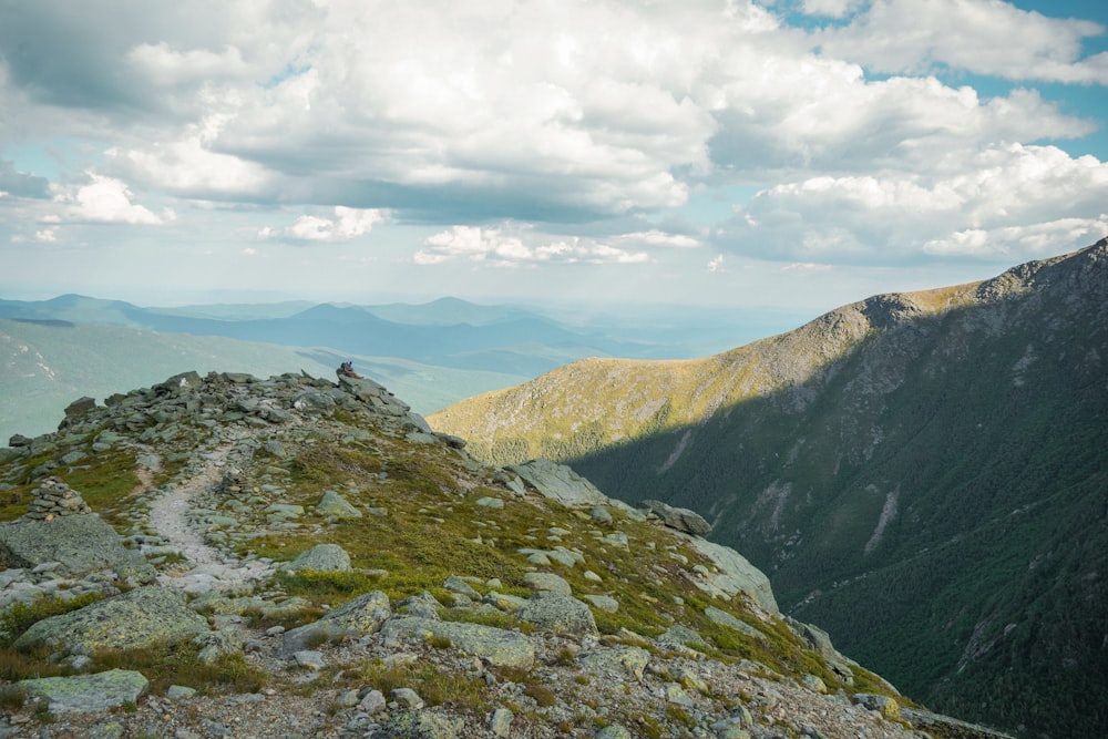 a person standing on top of a mountain