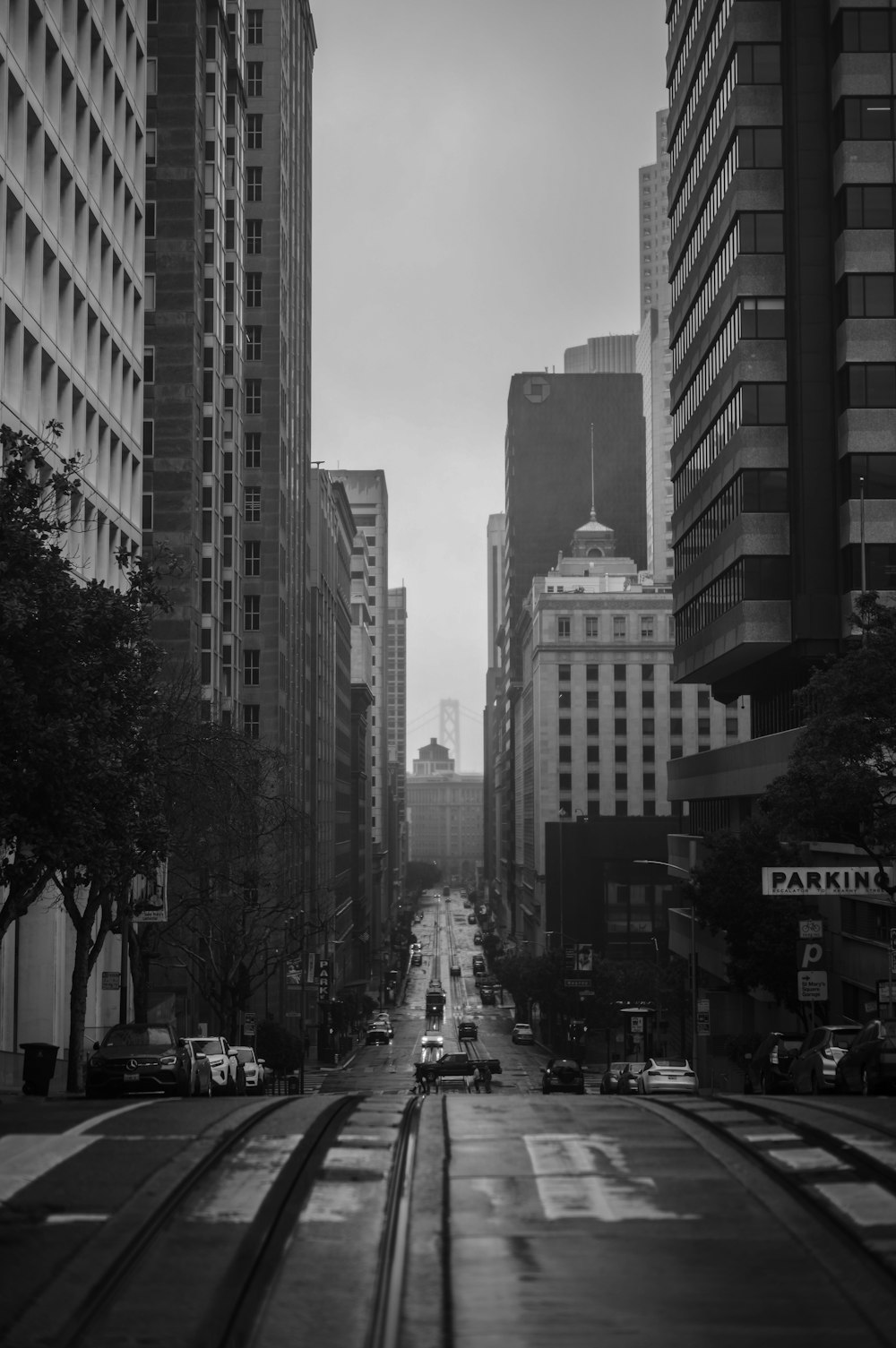 a black and white photo of a city street