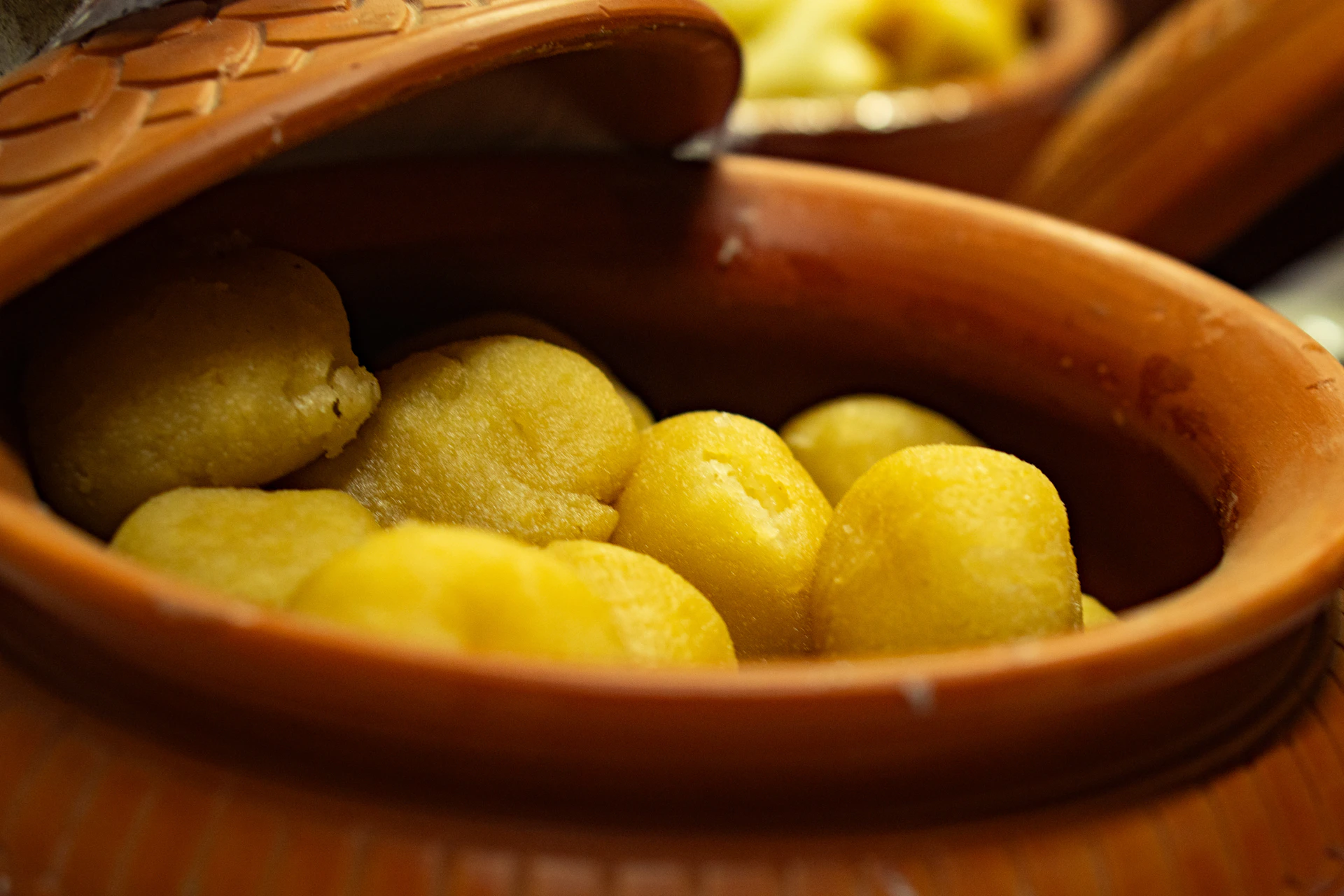 a close up of a bowl of food on a table