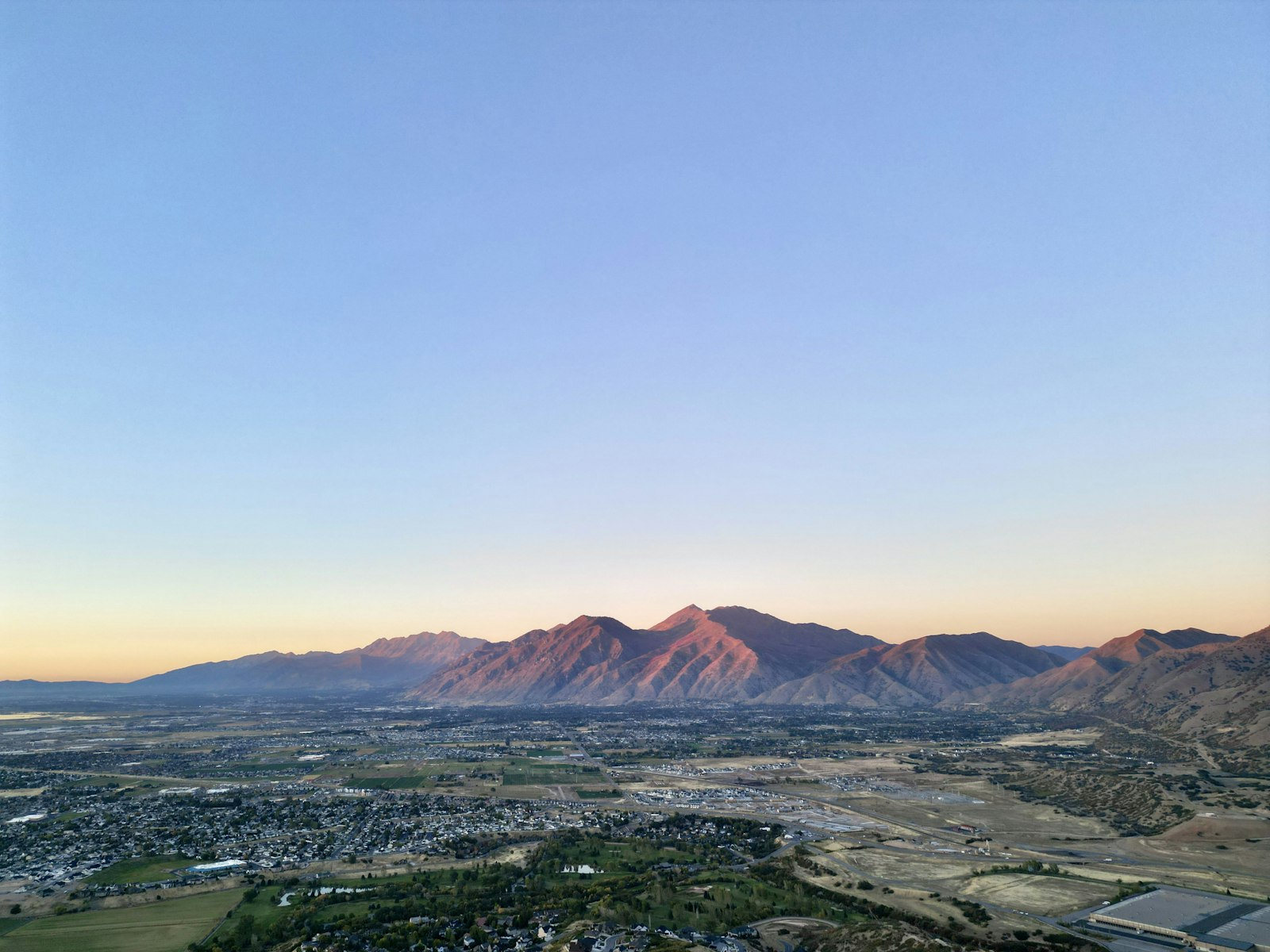 Aerial view of a Utah County community and mountains near Cedar Fort, UT homes for sale