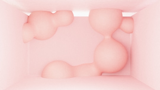 a pink box with a baby in it