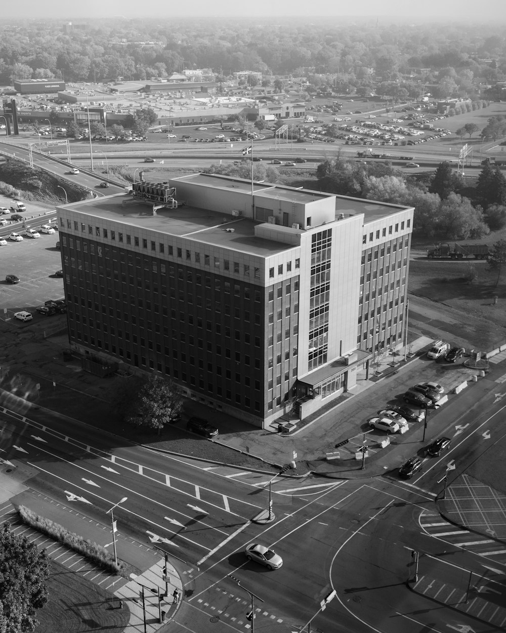 a black and white photo of a large building