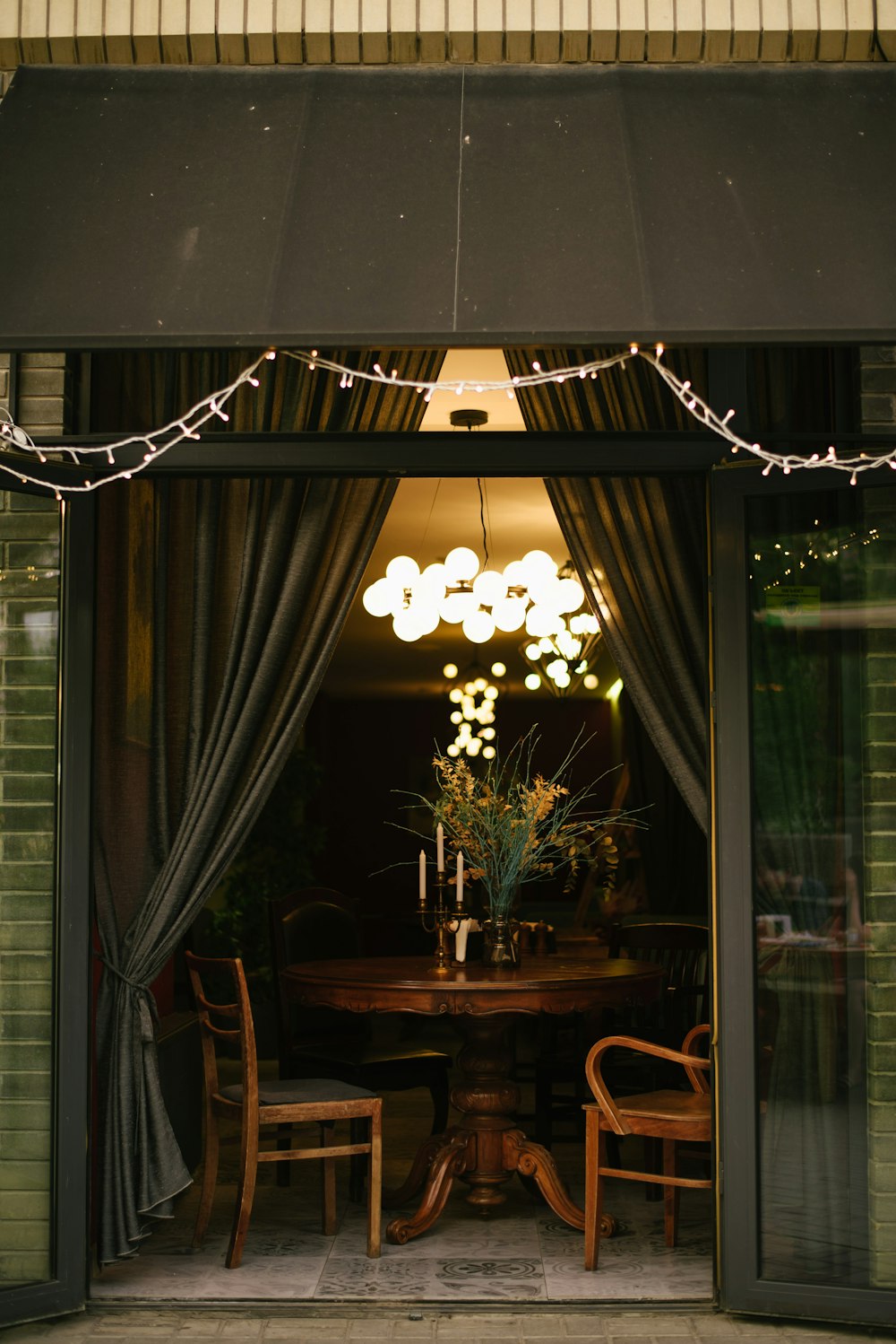 a dining room with a table and chairs