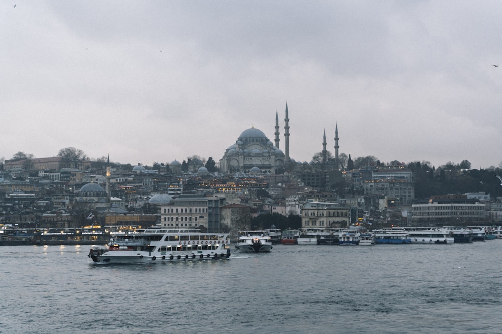 a large body of water with boats floating on top of it