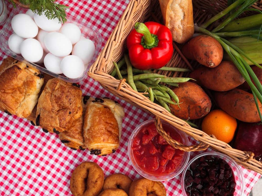 a table topped with baskets filled with food