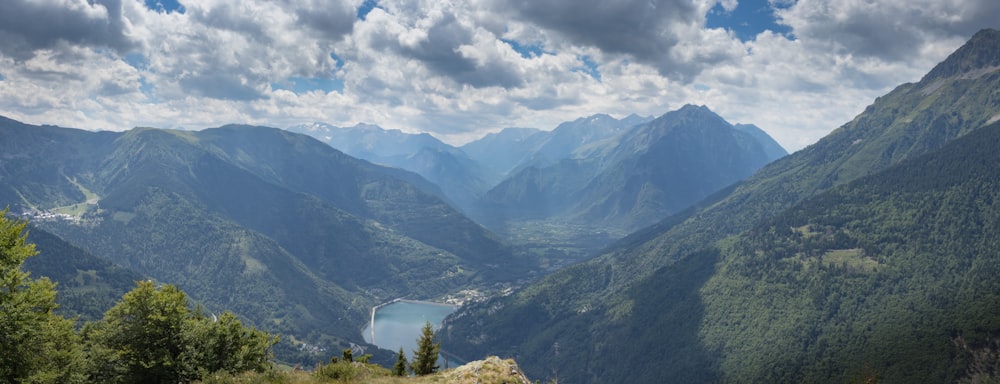 a scenic view of mountains and a lake