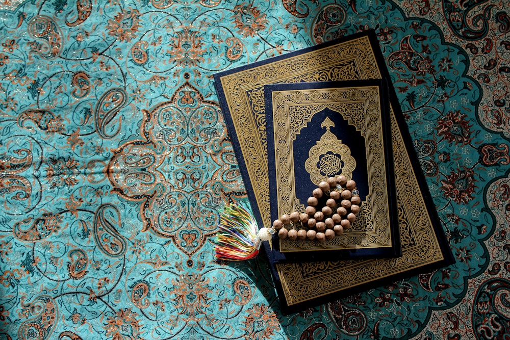 a rosary laying on top of a book