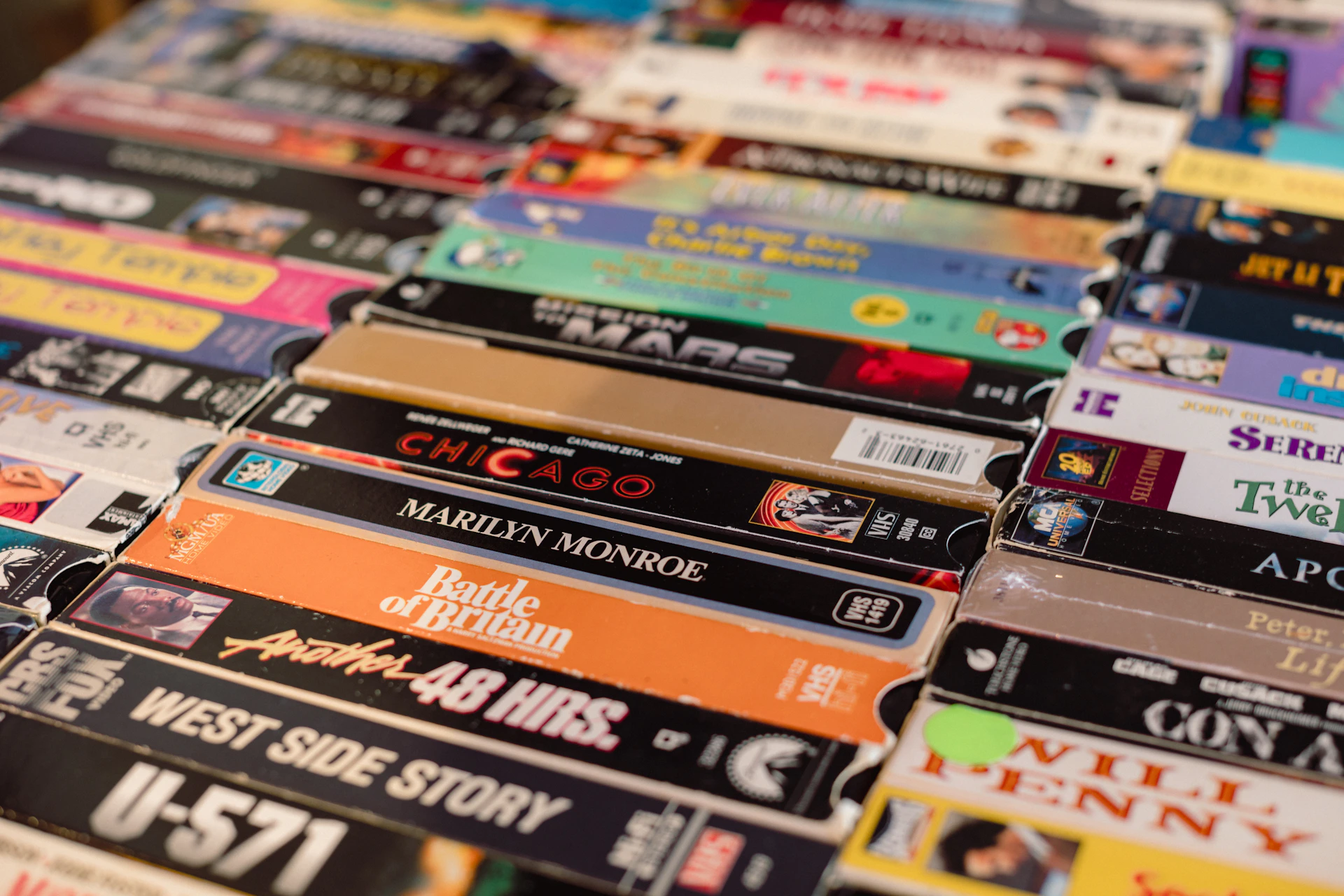 a bunch of different types of dvds on a table