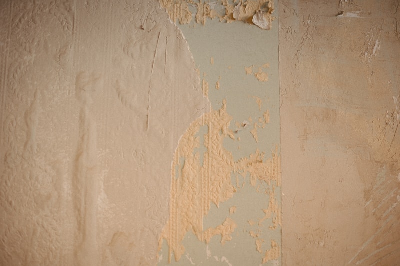 Wall with hairline cracks showing plaster damage